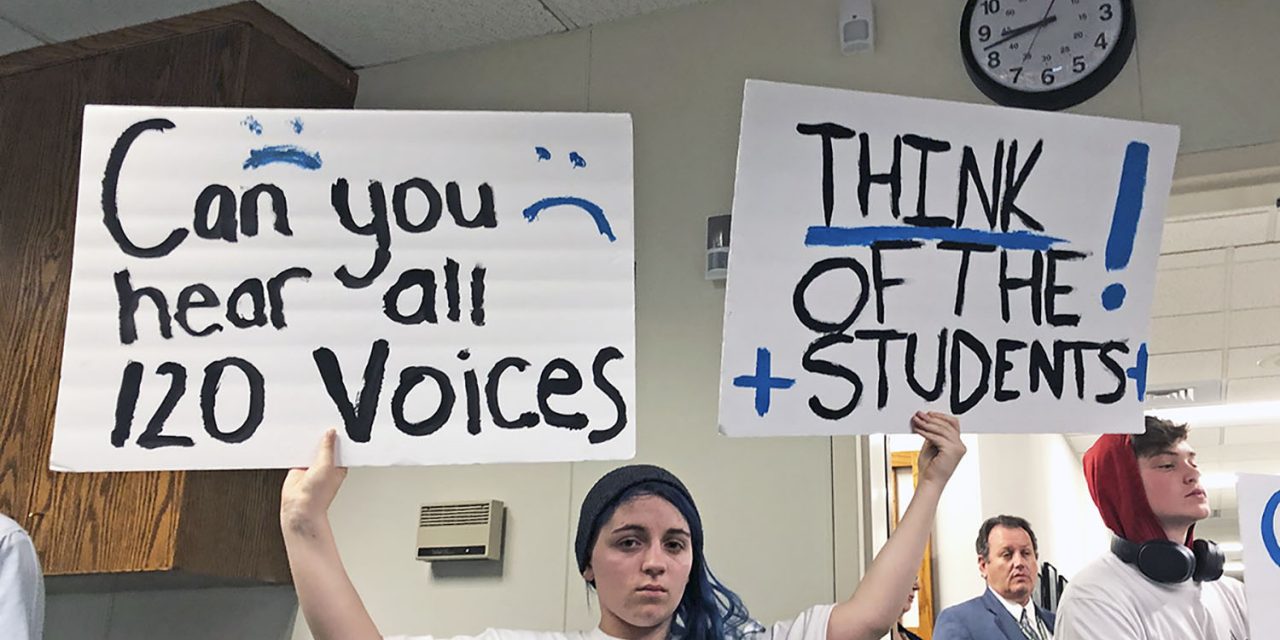 Emotions Run High as School Board Cuts Programs and Employees